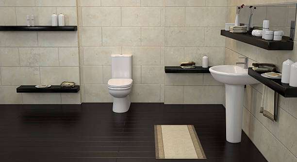 Spacious bathroom with toilet, sink, and a beige bath mat.